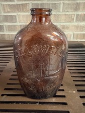 Vintage Caldwell's Embossed Amber Empty Rum Bottle with Three Mast Sailing Ship picture