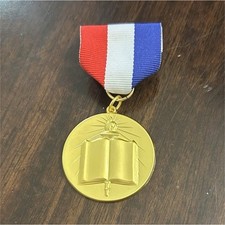 Gold Academic Achievement Medal with Red White Blue Ribbon, case picture
