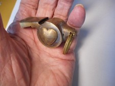 Police type whistle with heart picture