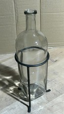 Unique Vintage Glass Bottle with Square Bottom and Metal Stand picture