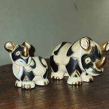 Handmade Ceramic Rhinoceros Figurine Pair Black/Cream/White with Gold Accents picture