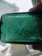 c1850s 5 in GW. Merchant Lockport, N Y Dark teal green Medicine Bottle Pontil picture