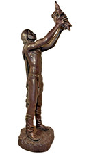American Native American Figure Holding Raised Animal Skull by Austin Production picture