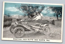 1910 Butte des Morts WI Giant Fish Catch Model T Car Postcard picture