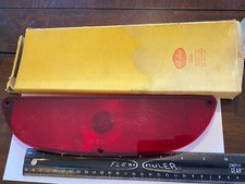 VINTAGE PART IN BOX 1960 FORD PASS STOP & TAIL LENS - TMC-730 G801 GLO BRITE picture