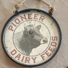 Pioneer Dairy Feeds Advertising Sign Cow Graphic Round Black White Red picture