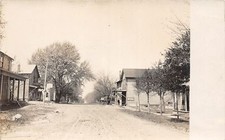 E91/ Damascus Ohio RPPC Postcard 1910 Main Street Homes Store 7 picture
