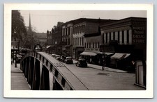 1949 RPPC Rochester NY Fairport Van Dyck Main Street Bridge Cars Drug Store picture