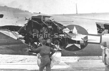 WW2 Picture Photo US Crew B-17 bomber inspects damage to his plane  3657 picture