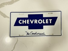 Vintage Mr. Goodwrench Chevrolet Bowtie Booster License Plate GM Dealer Tag picture