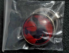 VINTAGE THUNDERCATS LOGO KEYCHAIN RED AND BLACK SEALED picture