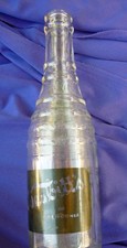 LOT OF  2 VINTAGE NESBITT'S SODA BOTTLES FROM 1938 APPLIED BLACK LABELS BOTH GR8 picture