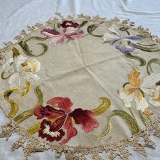 Round Doily With Embroidered Orchids And Delicate Trim picture
