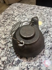 This is a vintage Wagner Ware cast iron tea kettle from 1891 picture