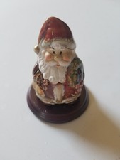 PREOWNED PORCELAIN SANTA CLAUS FIGURINE ON WOOD BASE 2.75