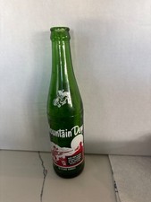 Mountain Dew Vintage Green Glass Bottle 10 fl oz “It’ll Tickle Your Innards” picture