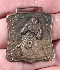 Old Embossed Brass Motorcycle Watch Fob - 1910's era - Bicycle Racing picture