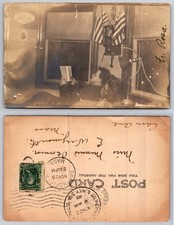 1905 RPPC Man Reading Room Interior American Flags Genealogy Postcard picture