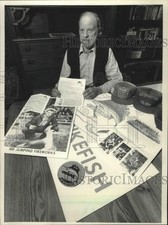 1987 Press Photo Jim Greenwith, with items from the Spikefish, Wisconsin. picture