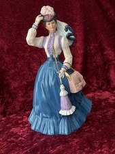 VTG. 1996 Avon President's Club Beautiful Mrs. P.F.E. Albee Award figurine. picture