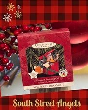 VINTAGE HALLMARK 1997 DONALD'S SURPRISE GIFT Hallmark Archives Series ORNAMENT picture