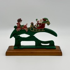 Vintage Midwest Importers Cast Iron Santa Sleigh Reindeer Nutcracker Wood Base picture