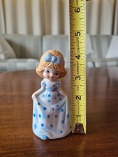 porcelain bell figurine of a girl picture