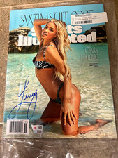 Sports Illustrated Swimsuit 2025 Magazine Cover Signed by Livvy Dunne. picture