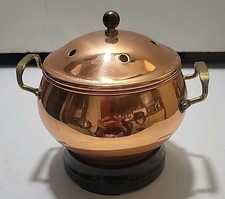 vintage copper potpourri or simmering pot with brass handles and a knob finial. picture