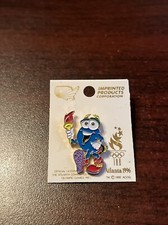 Vintage 1996 Atlanta Summer Olympics Izzy Mascot Carrying Torch Hat Pin picture