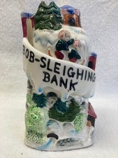 Vintage-1950's-Ceramic Bob Sledding Coin Bank picture