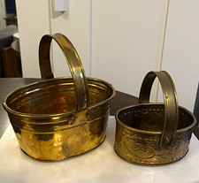 Set of 2 Oval Brass Baskets with Handles. One 4” wide and one 6” wide picture