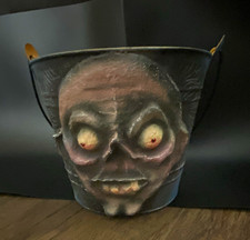 VTG Halloween metal candy pail has a Ghoulish face picture