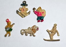 5 Celluloid 1940’s Cracker Jack Prize, Charm: Hula, Skier, Tiger, Anchor, Boy picture