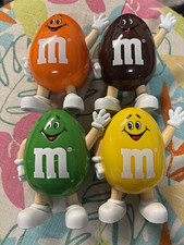Lot of 9 1997 vintage M&M’s figures picture