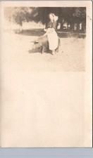 GIRL RIDING PIG c1910 petaluma ca? real photo postcard rppc california farm fun picture