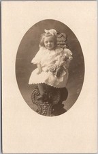 c1910s PLYMOUTH, Wisconsin Studio RPPC Postcard VERY Cute Little Girl with Doll picture