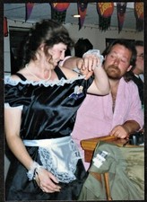Vintage Photograph Man Pulling on Woman's Maid Costume - Halloween picture