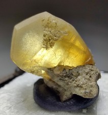 Calcite crystal on matrix, fully formed. Berry Quarry, Indiana. 2 cm. picture