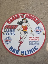 1963 Karen's Kwikee Kar Klinic Gas and Oil Porcelain Sign Skelly 12