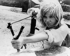 Sky West and Crooked Hayley Mills takes aim with slingshot 12x18 Poster picture