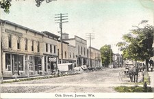 DOWNTOWN OAK STREET juneau wi c1910 postcard wisconsin historic scene shops picture