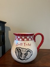 ceramic pitcher features a hand-painted Big Al elephant graphic  picture
