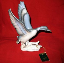 ATTRACTIVE ENESCO DUCK PORCELAIN FIGURINE  picture