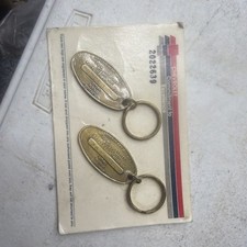 NOS (2) Vintage Chevrolet Commitment to Excellence Keychains Return Postage Guar picture