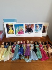 Large collection of 13 Disney princesses, some vintage, with laminated pictures picture