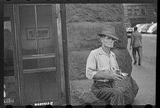 Photo:Duluth Minnesota 1930s Man on Stone Wall City Street Scene picture