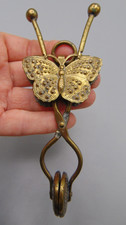 ANTIQUE VICTORIAN BRASS BUTTERFLY SKIRT LIFTER picture