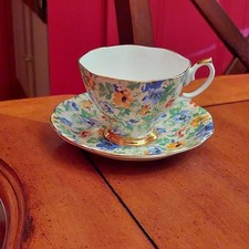 Imperial Fine English China Cup and Saucer Floral Pattern Warranted 22 KT. Gold picture