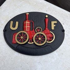 VINTAGE CAST IRON UF UNITED FIREFIGHTER INSURANCE STEAM FIRE ENGINE PLAQUE SIGN picture